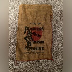 Planters Peanut 5lb Sack. Packed by National Peanut Corporation.One Edge is Torn